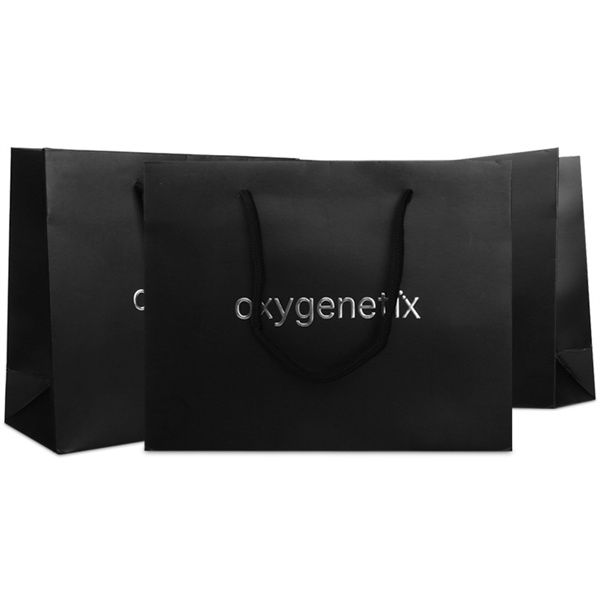 Black laminated paper bags with silver logo printing